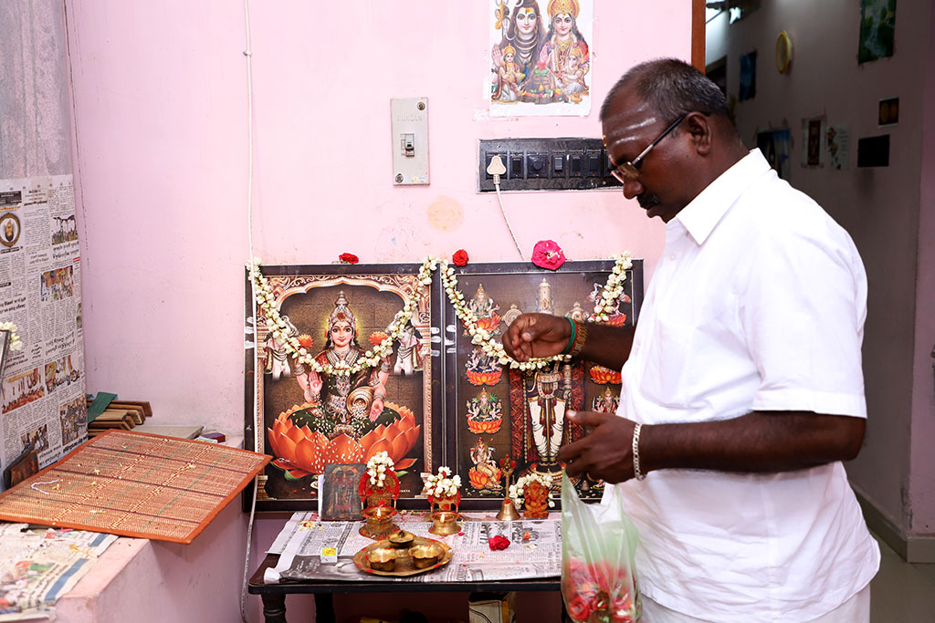 Palm Leaf Horoscope reader Swami Velmurugan preparing a puja, Tamil Nadu, India