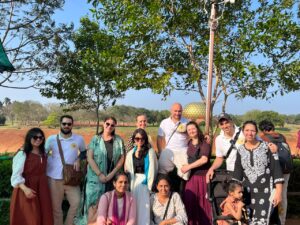 Mypalmleaf group at Auroville with the Matrimandir in the background