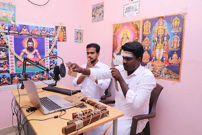 Nadi readers conducting an online palm leaf reading session in South India