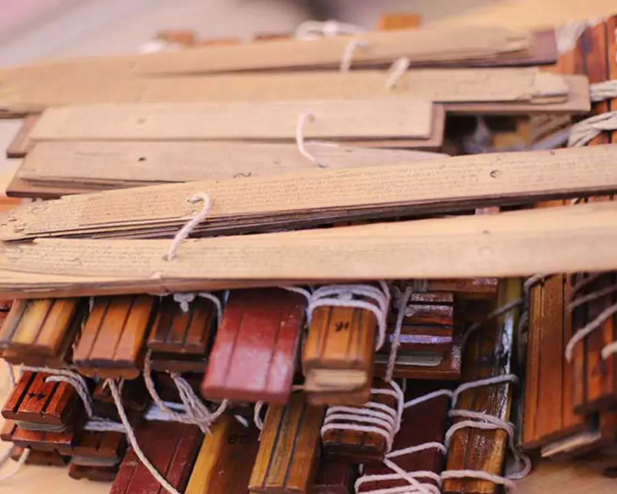 Stacks of bundled ancient palm leaf manuscripts